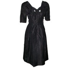 Vintage Mollie Parnis early 1950s black silk dress 44 bust