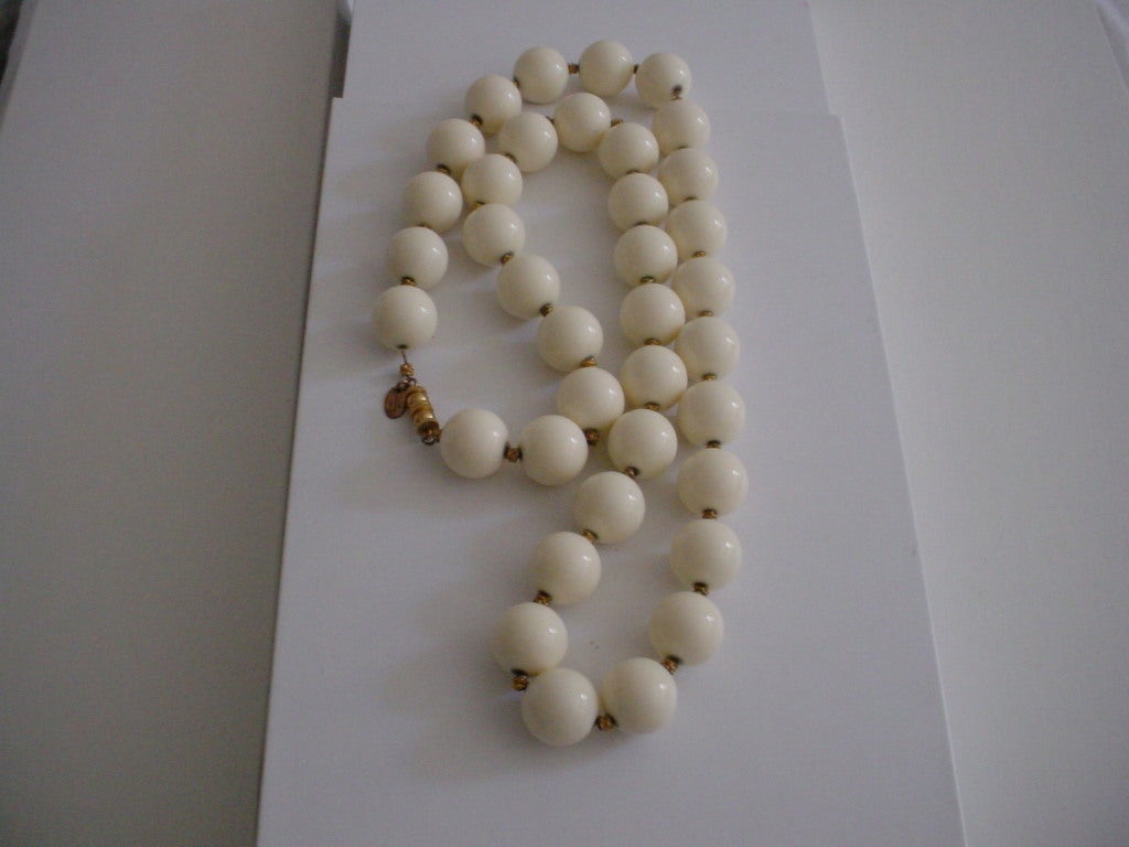 Vintage Les Bernard faux ivory necklace. Signed. 32 inches long.