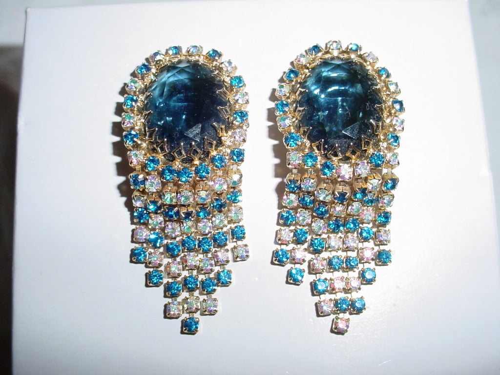 1950s extravagant blue earrings with articulated rhinestone fringe