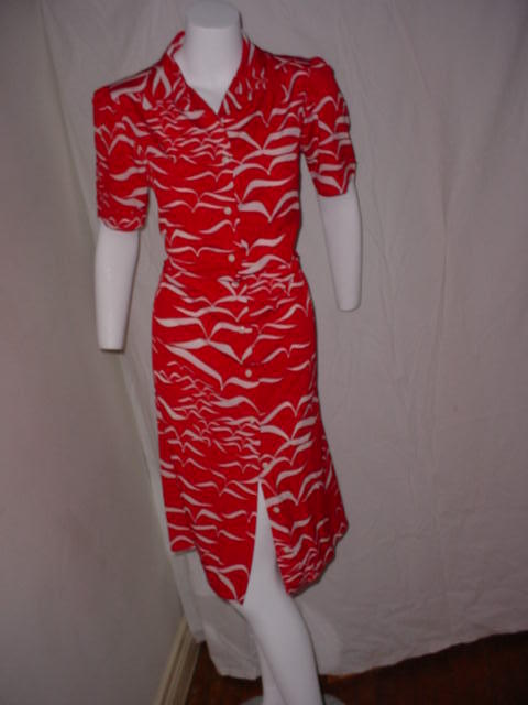 Vintage red and white classic style Lanvin dress. Excellent condition. Labeled size 16. Fits up to a 43 inch bust, 43 inch hips, 42 inches long. Button front.