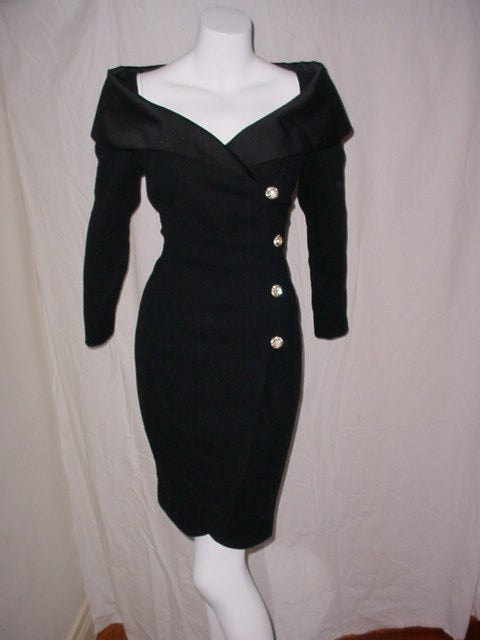 Beautiful vintage wrap dress by Scaasi from the 1980s. Classic style with huge portrait collar and rhinestone buttons. Excellent condition.  Wool crepe with satin collar. Labeled size 8.  37 inch bust, 30 waist, 38 hips. 37 inches long.