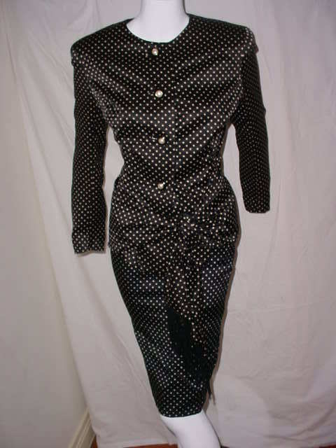 Travilla suit with fringed drape with