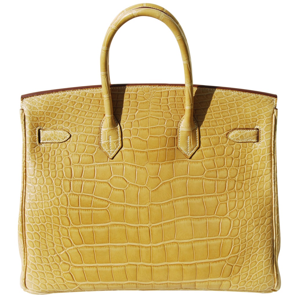 Createurs de Luxe is happy to offer this brand new Hermes handbag!

35cm Hermes Matte Paille Alligator Birkin Handbag | Palladium Hardware | L Stamp

The bag measures 35cm / 14