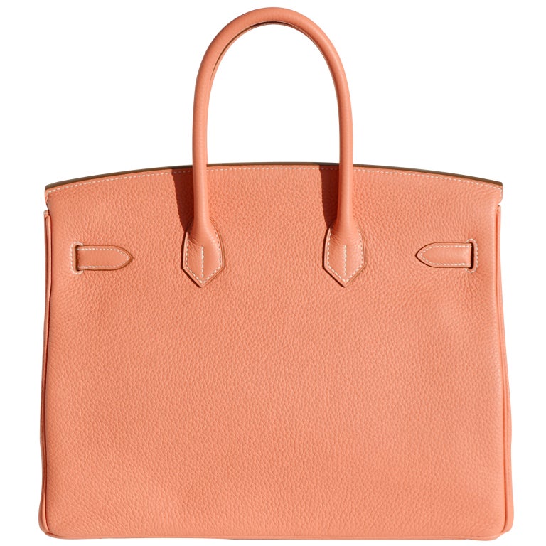 Createurs de Luxe is happy to offer you this brand new Hermes Birkin Handbag in one of Hermes' new 2013 colors, Crevette.

NEW COLOR FOR 2013!

BRAND NEW

35cm Hermes Crevette Taurillon Clemence Leather Birkin Handbag with White Stitching |