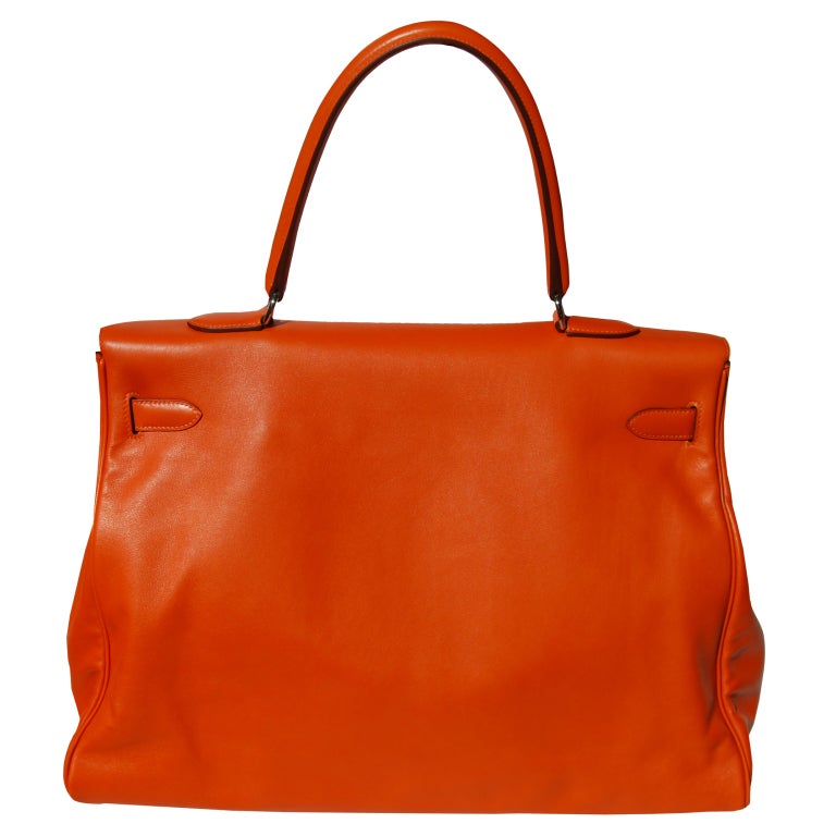 Createurs de Luxe, reseller of Hermes Handbags offers this new 50cm Hermes Orange Sikkim Relax Leather Kelly Handbag with palladium hardware!

Who says you have to be Kim Kardashian to get this bag to strut your stuff!!!

50cm Hermes Orange