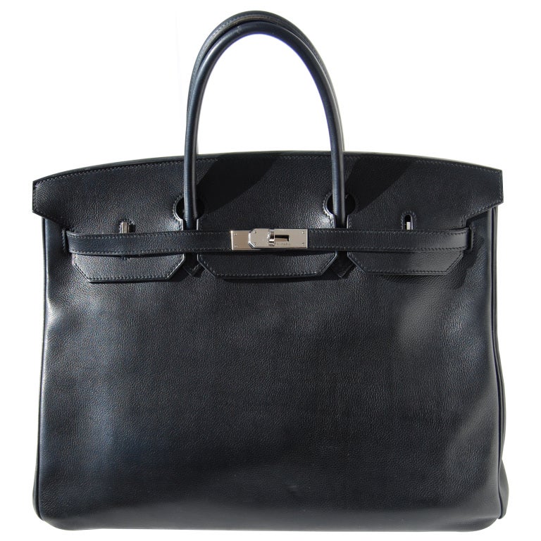 BEAUTIFUL!
PRE-OWNED 

40cm Hermes Black Evergrain Leather Birkin Handbag | Palladium Hardware | L Stamp

In great condition. 

The bag measures 40cm / 16