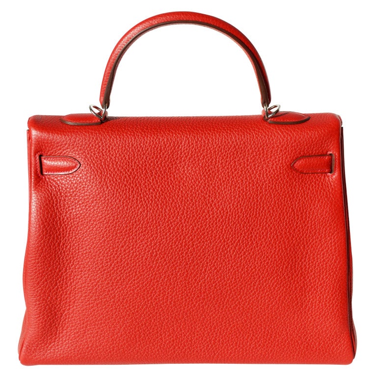 Brand New!
35cm Hermes Rouge Casaque Taurillon Clemence Leather Kelly Handbag | Palladium Hardware | Q Stamp

WoW! Gorgeous color!

The bag measures 35cm / 13.75