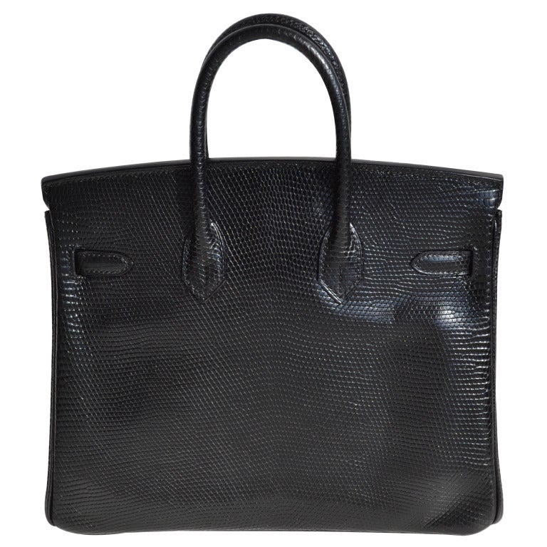 Créateurs de Luxe is happy to bring you this absolutely gorgeous pre-owned 25cm Hermès Shiny Black Lizard Birkin Handbag with White Gold Hardware + Diamonds! 

OH MY FABULOUS! 

Pre-Owned

25cm Hermès Shiny Black Lizard Birkin Handbag | White