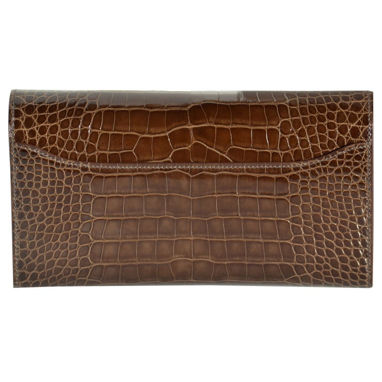 Brand New!

Hermes Shiny Gris Elephant Alligator Constance Wallet | Gold Hardware | Q Stamp

The bag measures 21cm / 8