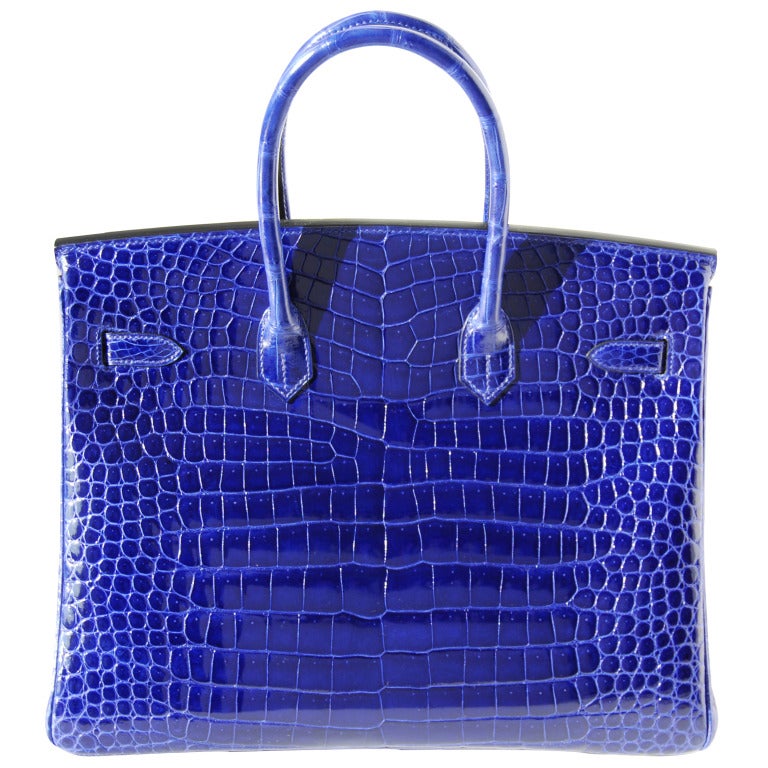 Créateurs de Luxe is happy to bring you the absolutely stunning 35cm Hermes Shiny Bleu Electrique Porosus Crocodile Birkin Handbag!

FABULOUS COLOR!!

DON'T HATE ME BECAUSE I'M BEAUTIFUL!

BRAND NEW

35cm Hermes Shiny Bleu Electrique Porosus