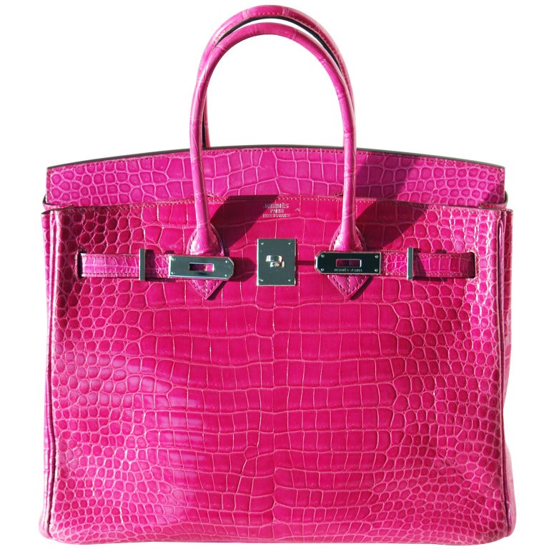 Pre-Owned Beauty!

35cm Hermes Shiny Fuchsia Porosus Crocodile Birkin Handbag | Palladium Hardware | J Stamp

The bag measures 35cm / 14