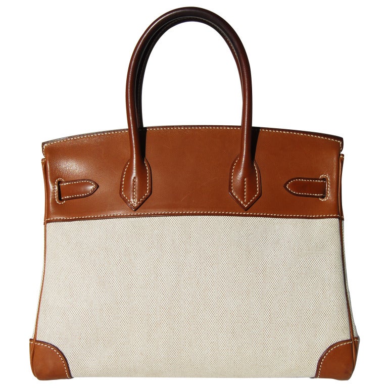 Pre-Owned Beauty!
30cm Hermes Two-Toned Barenia Leather and Toile H Birkin Handbag | Palladium Hardware | J Stamp

The bag measures 30cm / 12