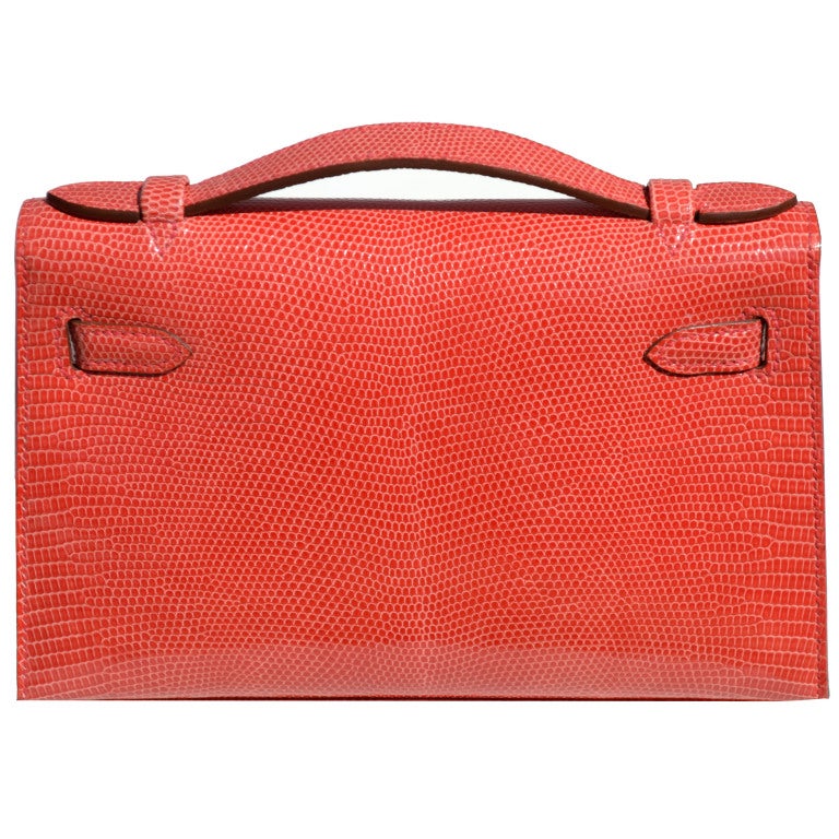 Creatéurs de Luxe offers this brand new Hermès Kelly Pochette!

Brand New!

Hermès Rose Jaipur Lizard Kelly Pochette | P Stamp | Palladium Hardware 

The bag measures 21.6 cm or 8.5