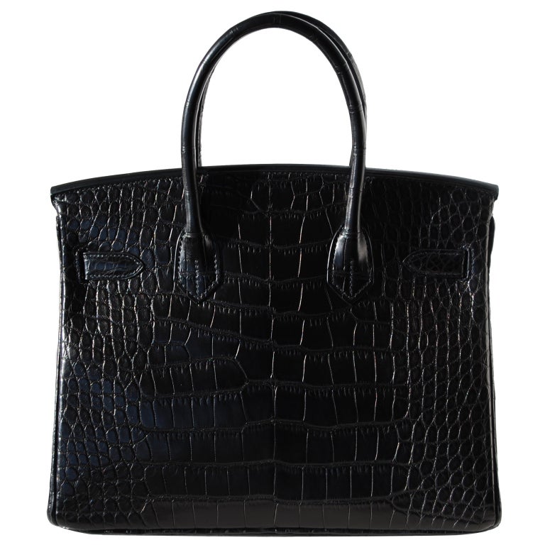 BRAND NEW
Creatéurs de Luxe offers this brand new Hermès Birkin Handbag.

30cm Hermès Matte So Black Alligator Birkin Handbag | Black Hardware | N Stamp

The bag measures 30cm / 12