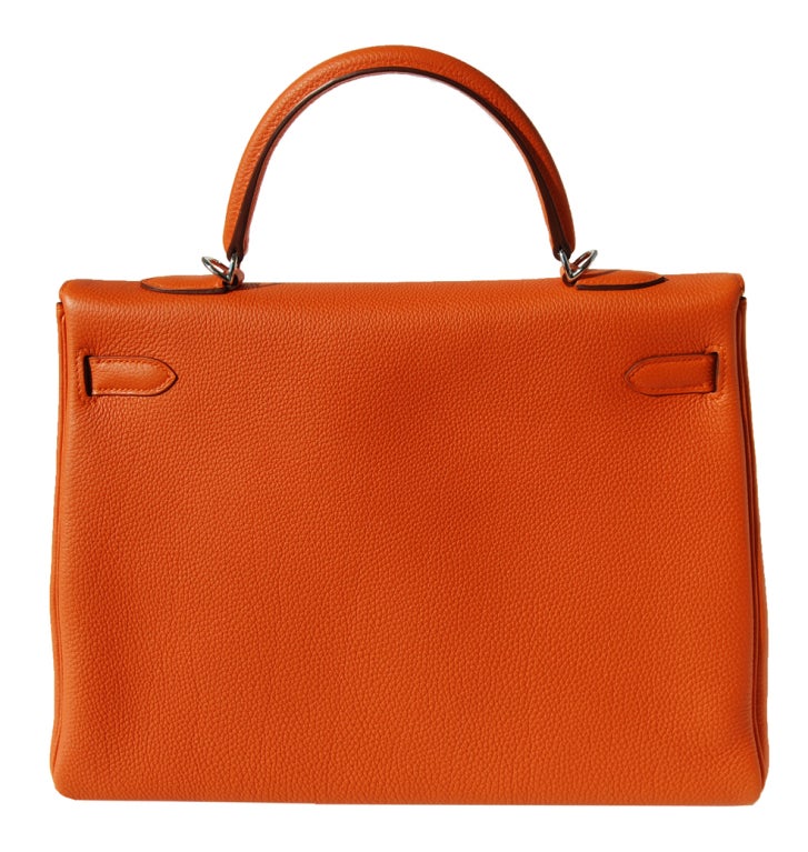 Createurs de Luxe offers this brand new 35cm Hermes Kelly Handbag!

35cm Hermes Orange Togo Leather Kelly Handbag | Palladium Hardware | O Stamp

The bag measures 35cm / 13.75