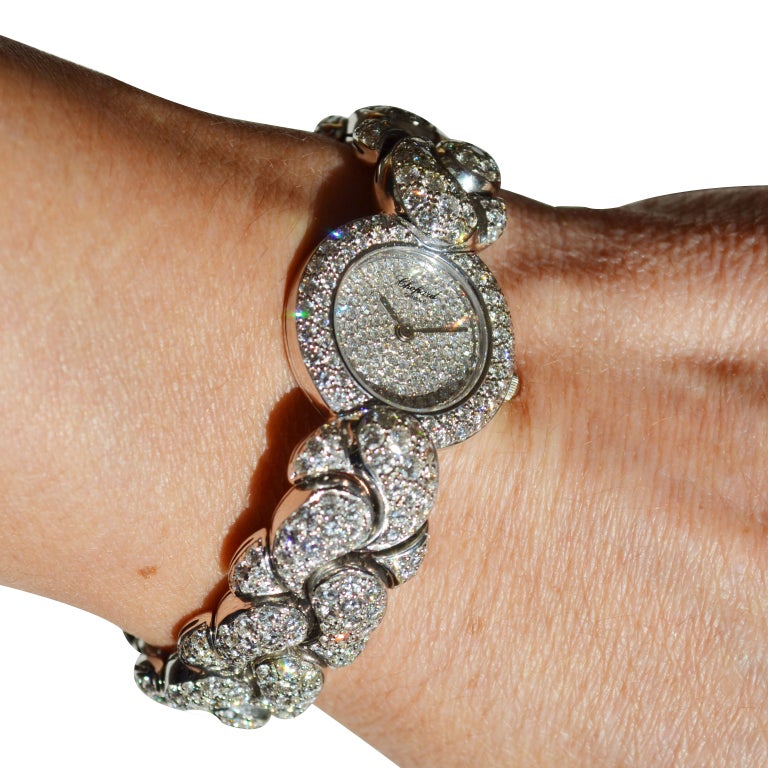 Chopard Casmir lady's 18k white gold and diamond-set bracelet watch

Serviced 1.5 years ago. It has been worn 3 or 4 times. 

The signature and markings on the watch are as follows:

Dial: Chopard
Back: Water Resistant, Casmir, 43/5856 -