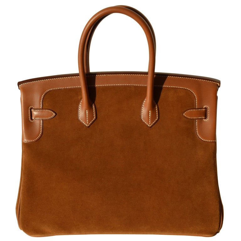 HOT NEW BAG!

Creatéurs de Luxe offers this brand new Hermès Birkin Handbag

BRAND NEW

35cm Hermès Grizzly Barenia Leather and Suede Birkin Handbag | Permabrass Hardware | P Stamp

The bag measures 35cm / 14