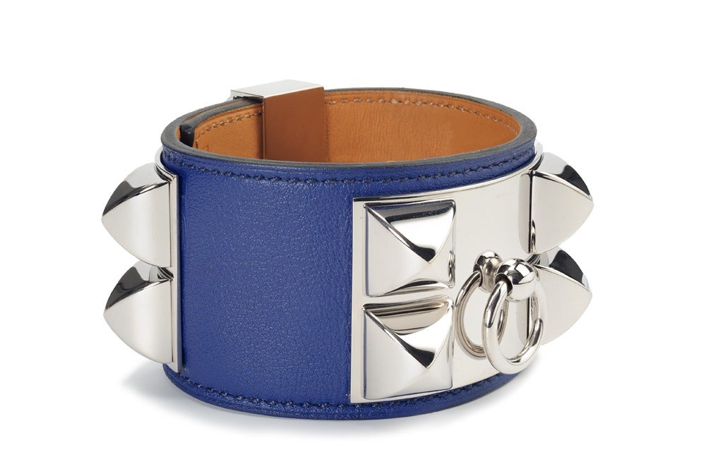 PRICE INCLUDES SHIPPING & INSURANCE

BNIB CDC bracelet made of chamonix leather in colour 'bleu saphir' accentuated with palladium hardware.

Size small; will fit medium sized wrist as well since the bracelet is adjustable.

Comes as a full