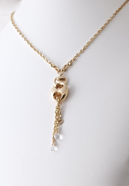 What a fantastic necklace from Gucci. It is 18K solid yellow gold with .5 cts of white diamonds and two, gorgeous, white sapphire briolette pendants. This is a BRAND NEW, with tags and box, necklace from the masters at Gucci. This necklace was sold