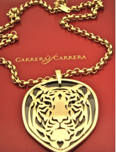 gold lion pendant with diamonds