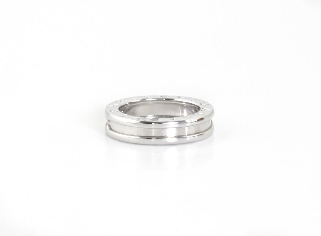 This is a classic design from Bvlgari. Not too big, not too flashy, but very cool and modern.

SIZE: 4.75

WEIGHT: 6.75 grams

HEIGHT: .45 cm

DIAMETER: 2.1 cm

METAL: 18k White Gold

CONDITION: Excellent