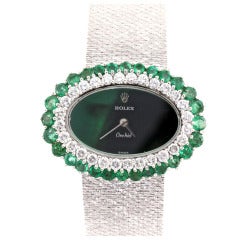 Rolex Lady's White Gold, Diamond and Emerald Bracelet Watch
