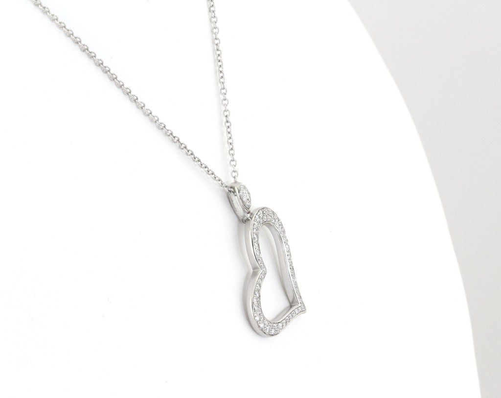 This Piaget heart necklace is a perfect gift. It'll fit, it'll go with anything, and it says how you feel. Classic and sweet. She'll love it.

 

WEIGHT: 13.4 grams

LENGTH OF CHAIN: 43 cm

WIDTH OF HEART: 3.1 cm

DIAMOND WEIGHT: