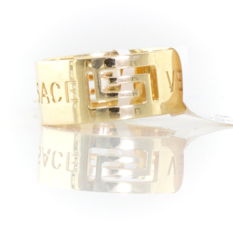 This is a really simple, really cool ring. It has a Greek geometric design cut out of the gold, with 