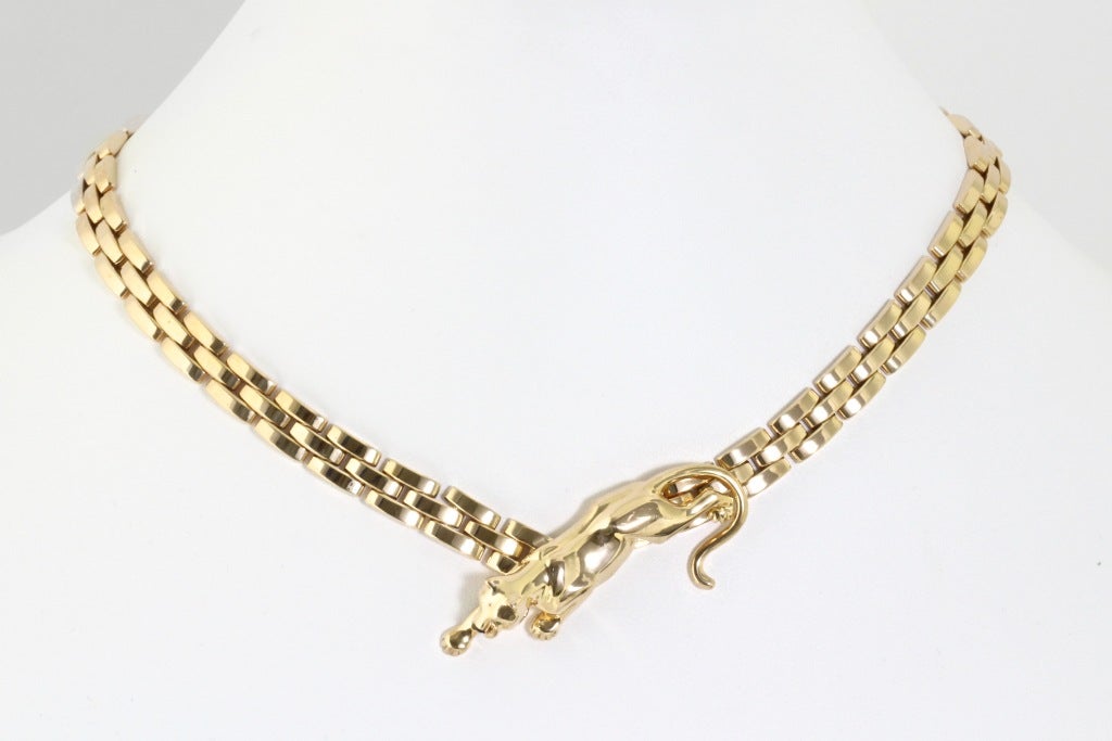 If you don't like this necklace, then just go away. Be gone! For everyone else... I know. It's kind of awesome. Cartier panthers are the best. This gold Cartier necklace is so chunky and gorgeous. And let's talk about the panther. It's like it's