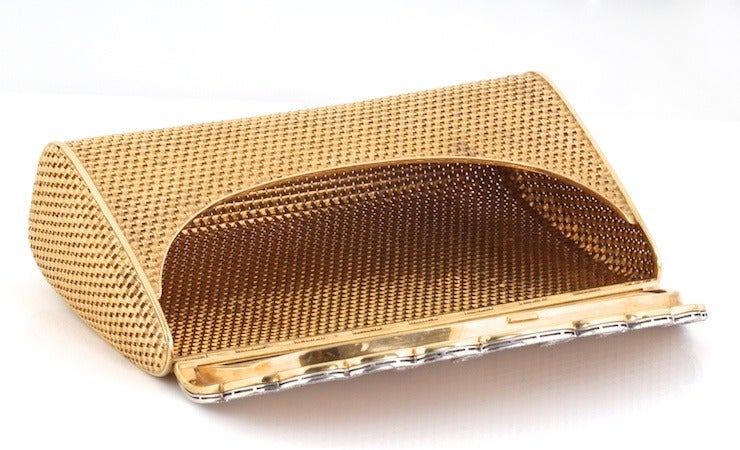 For the woman who has everything, how about a gold purse? It's basically solid gold. Except for the mirror. Oh yeah, and the five carats of diamonds. This is a seriously bonkers accessory. It's really beautiful and luxurious (it's a gold purse after