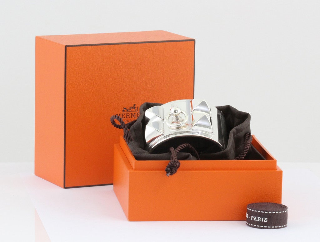 Hermes COLLIER DE CHIEN bracelet is very, very popular all over the world.  Especially in Sterling Silver CDC. It's very rare in every Hermes Boutique Store. We bought it directly from an Hermes boutique.

WEIGHT: 234 grams

INTERNAL DIAMETER: