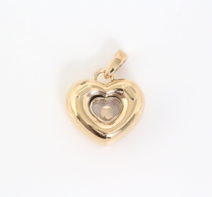 Do you know someone with a hole in her heart? A hole that can only be filled with true love? Or perhaps a diamond. If so, this is literally the perfect gift. It's from Chopard, and it's a chunky gold heart with a floating, or 