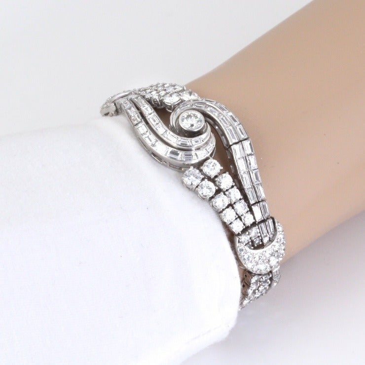It's too many diamonds! Too luxurious. Too pretty. Seriously, the craftsmanship and swirly design of this vintage platinum bracelet are just gorgeous. It catches the light in such interesting ways, due to the various cuts and sizes and placement of