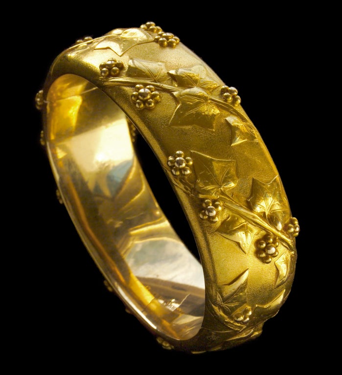 Superb Belle Epoque Ivy Bangle by the important Parisian Goldsmith & Jeweler Emile Froment-Meurice
This rare & beautiful gold bangle is steeped in symbolism.
Ivy has always been regarded as a symbol of friendship & fidelity. The Druids wove sprigs