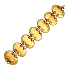 CARTIER Fabulous Hammered Gold Oval and Stitch Link Bracelet at 1stDibs