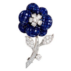 Van Cleef and Arpels Invisibly Set Sapphire Diamond Flower Brooch