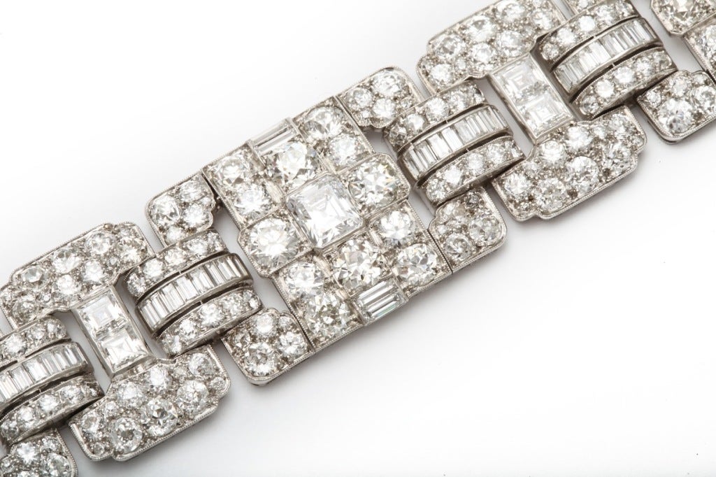 Art Deco Diamond Platinum Bracelet
The beautiful Art Deco bracelet features European cut, square shaped and baguette cut diamonds totaling approximately 40 carats.
The quality of the diamonds is E-F, VS.