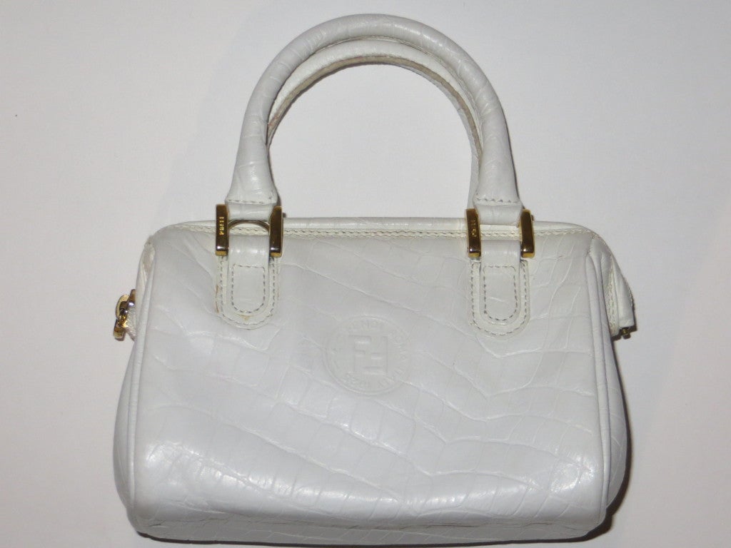 Fendi white mini leather doctors bag with  brass fittings and closures, leather lining.
