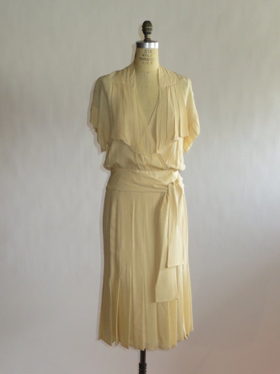 1980's Silk cocktail dress with pleats, sash, and silk slip.