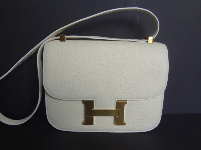 Extraordinary, rare and Authentic Hermès Constance in Whale skin.

This Hermès Constance is in very good condition and very clean.

It is in Whale skin in white color. Nowadays, it is absolutely IMPOSSIBLE to have a Hermes bag in Whale skin. It