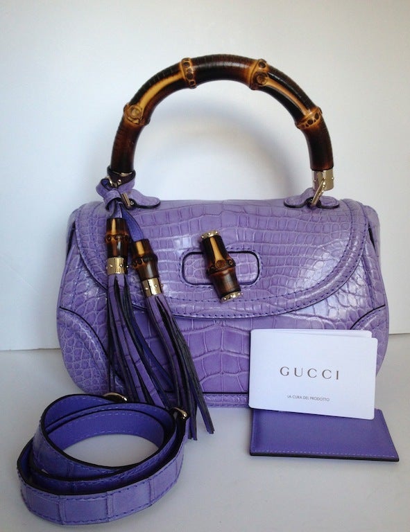 Gucci New Bamboo alligator Parme - Limited Edition for French magazine Madame Figaro
Very rare color
Crocodile Alligator in parme color
Famous bamboo handle
New condition – never worn
Serial number – authenticity and « controllato »
Dimensions
