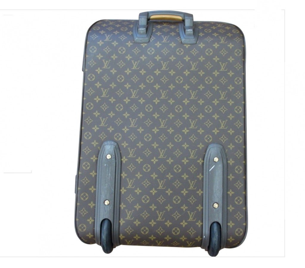 Louis Vuitton Pegase 70 
Made in France  
Rolling Luggage 
Material Canvas Leather  
Main color: Brown  
Monogram canvas is very good condition. 
Some scuffs and stains on leather surface. 
Shape:Very good condition.  
Corners : Minor scuffs