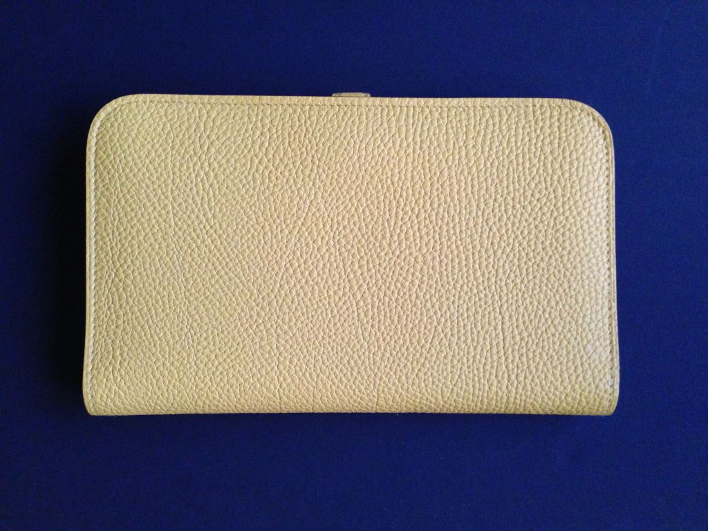 Hermes Dogon wallet Jaune d’Or 
Taurillon Clemence Jaune d’Or Gold plated hardware 
This wallet comes with a coin purses 
Hermes Paris Made In France 
New condition 
Never worn 
Plastic sealed on hardware
Dimensions : 7.8W x 5H x 1D 

All