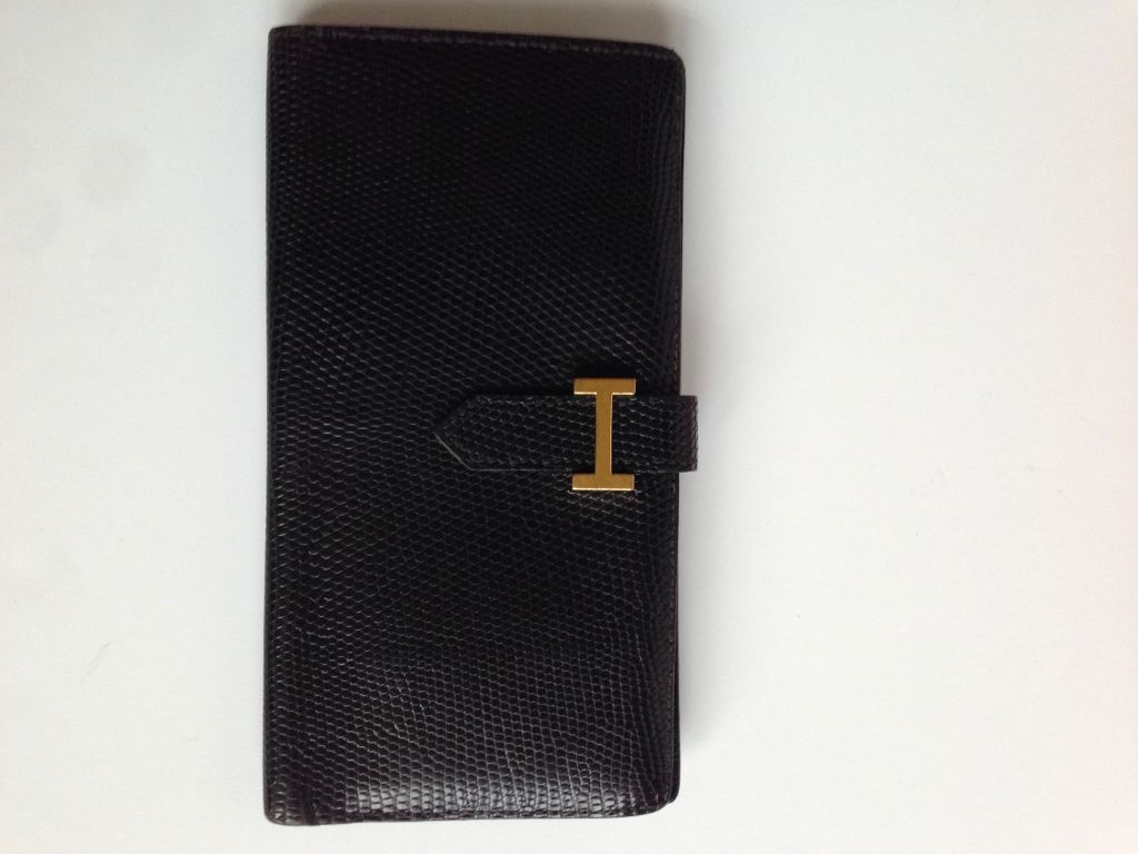 Hermes Bearn wallet black Lizard 
Good condition
Black Lizard skin and gold hardware

Hermes Paris Made In France
Long interior zip pocket
4 long interior slip pockets
5 vertical credit card slots

Dimensions : 6.75 x 3.5 x 1 inches

All