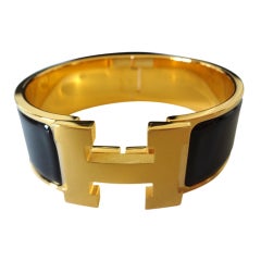 Hermes Clic Clac bracelet Black and gold
