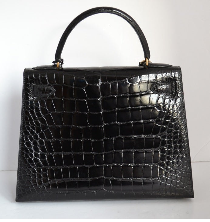 Women's Hermes Kelly 28 crocodile Mississippi with gold hardware