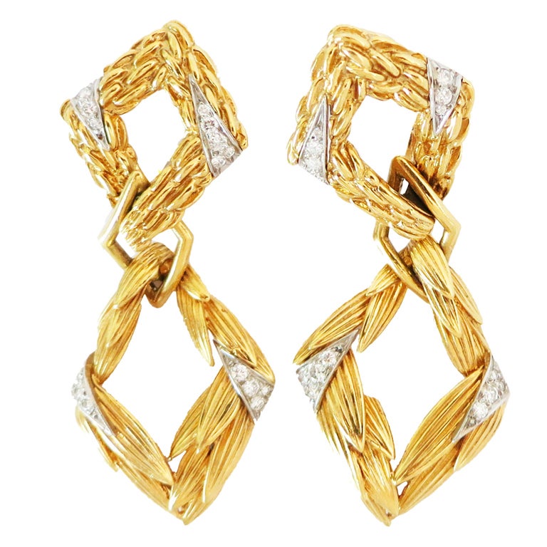 Pair of  gold and diamond pendant-earclips For Sale