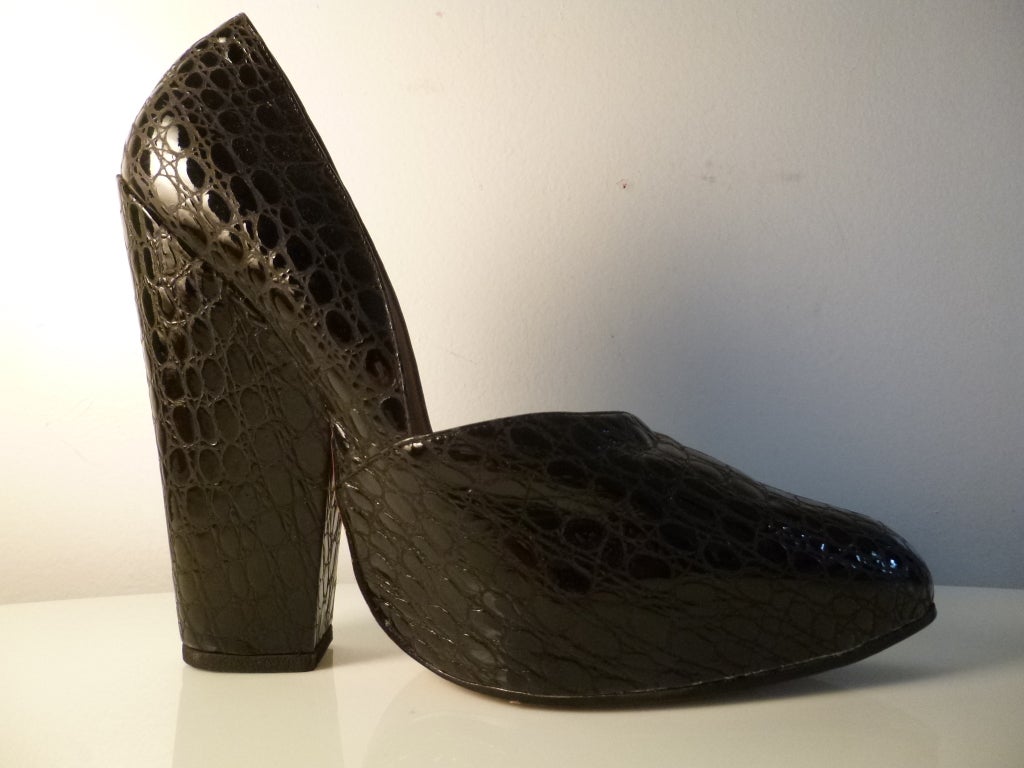Vertigo inducing Westwood platform heels with faux alligator grain. Leather upper, sole, lining, and quarter lining. They have been worn, but tenderly. They are still in great shape, with no scuffing at all to the upper, and just a bit to the sole.
