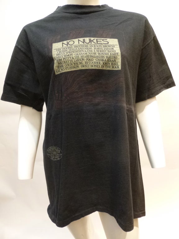 This is a promotional t-shirt for the 1978 Madison Square Garden No Nukes concert on September 19-23 1978. From the Muse Concerts For A Non-Nuclear Future. The list of performers is on the front: see photos. Some notables include CSNY, Bruce