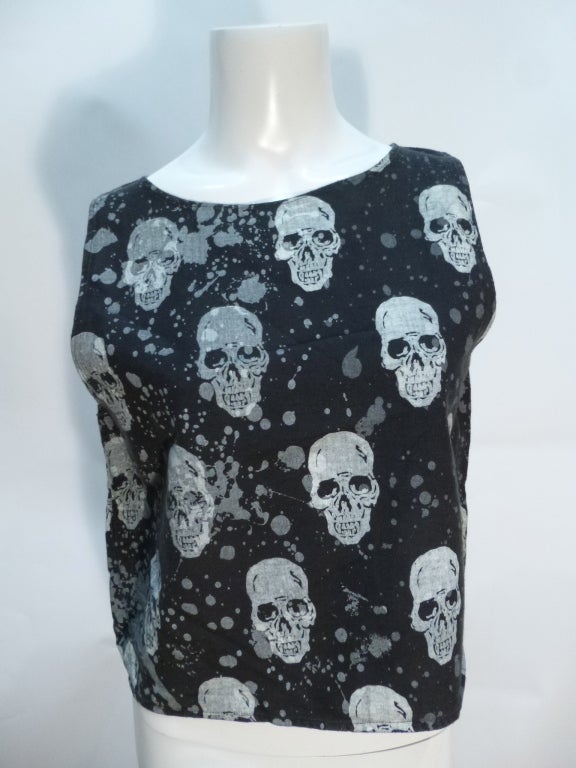 This is a BOY Of London tank from the late 1970s featuring skulls and a splatter design. From the collection of famous ceramics artist Cynthia Plaster Caster (look her up).

No stated size. Bust: 18